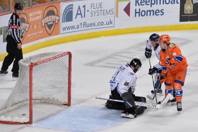 MAGIC MOMENT: Brandon Whistle scores hist first professional goal in the 5-1 win over Milton Keynes. Picture: Dean Woolley.