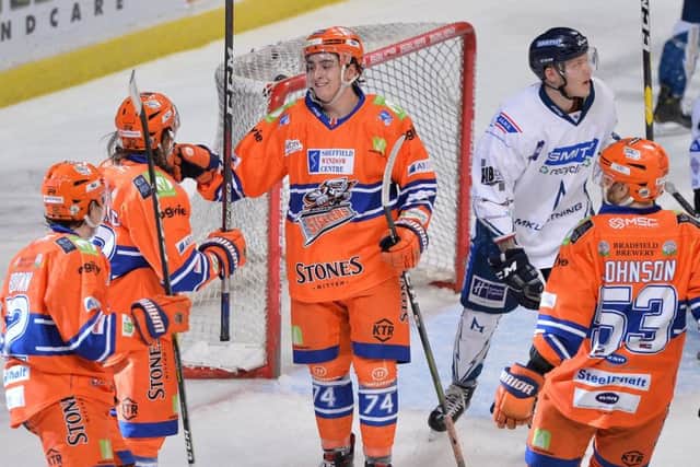 Brandon Whistle celebrates his first profesional goal with his Sheffield Steelers' team-mates. Picture: Dean Woolley.