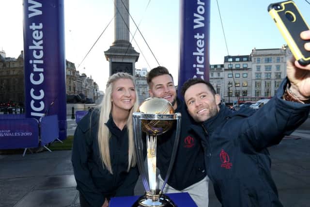 LONDON, ENGLAND - FEBRUARY 19: (L-R) Chris Hughes, Becky Adlington and Harry Judd take a selfie photograph with the ICC Cricket World Cup Trophy as they celebrate 100 days-to-go to the Cricket World Cup in Trafalgar Square. The â¬Sworldâ¬"s greatest cricket celebrationâ¬ starts in London on 30 May at the Oval and will culminate on 14 July at Lordâ¬"s with the winning captain lifting the trophy.  (Photo by Jack Thomas/Getty Images for CWC19)