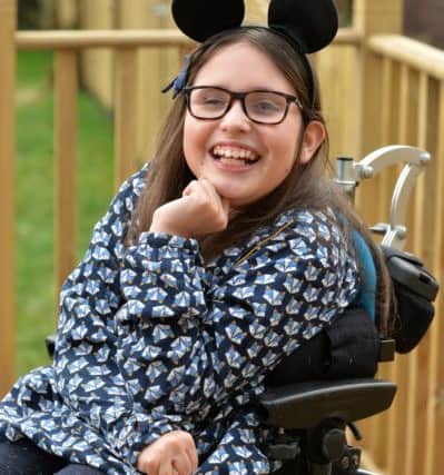 11 year old Jessie Wade-Rathbone has Cerebral Palsy which affects both her legs and her right arm and means she uses a wheelchair. She was nominated by Yorkshire Children's Trust for the dream holiday due to her inspirational work in bringing disability awareness to her peers.  Picture Bruce Rollinson
