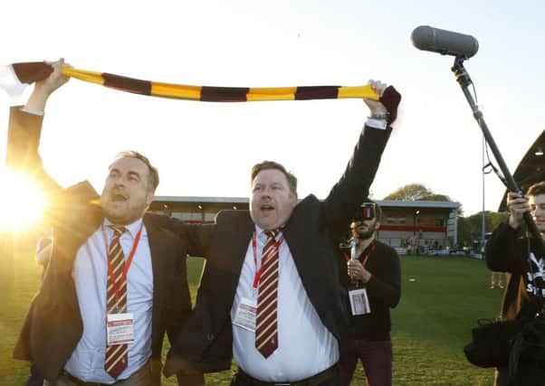 STICKING AROUND: Stefan Rupp, right, pictured with former co-owner Edin Rahic when celebrating at Fleetwood after reaching the League One playoff final. Picture: Martin Rickett/PA Wire.