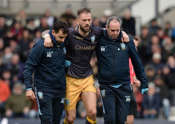 Sheffield Wednesday's Steven Fletcher is helped off after sustaining an injury earlier this month against Derby County (Picture: Steve Ellis).