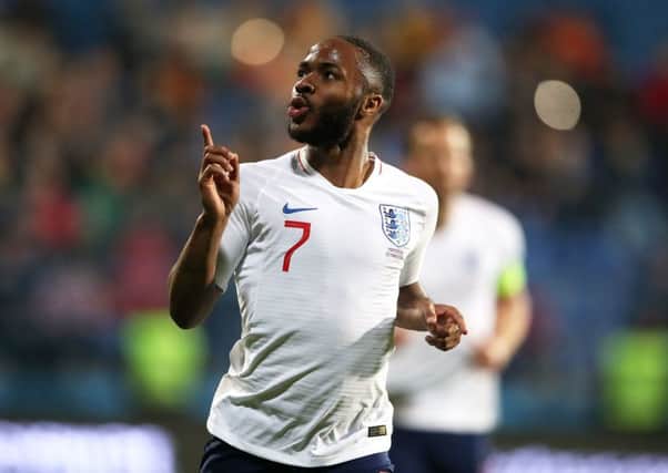 England's Raheem Sterling celebrates scoring his side's fifth goal of the game during their win over Montenegro at the Podgorica City Stadium on Monday (Picture: Nick Potts/PA Wire).