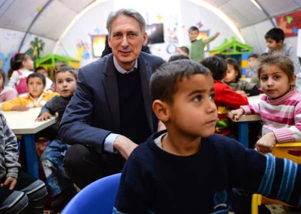 Philip Hammond at a refugee camp in Turkey in 2016. PIcture: PA
