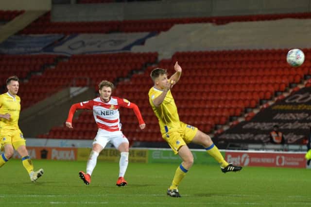 ON TARGET: Kieran Sadlier scores Doncaster Rovers, fourth goal against  Bristol Rovers.  Picture: Bruce Rollinson