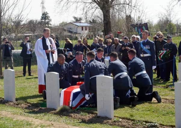 Ministry of Defence handout photo of the burial service with full military honours for World War Two Spitfire pilot Warrant Officer John Henry Coates at the Commonwealth War Graves Commission (CWGC) Padua War Cemetery in Italy.