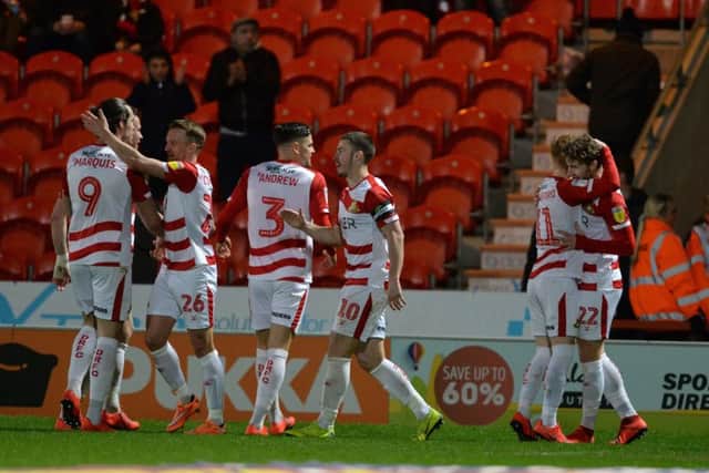 NICE ONE: Doncaster Rovers' players celebrate Kieran Sadlier's strike against Bristol Rovers.  Picture: Bruce Rollinson