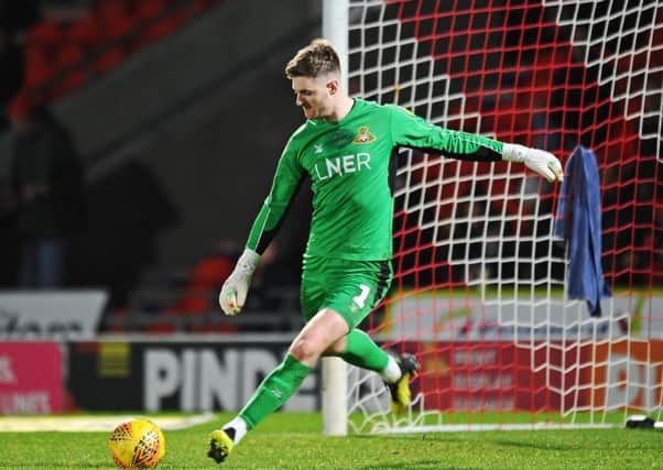 Doncaster Rovers' goalkeeper Ian Lawlor seen in action before shoulder surgery put him out for the season.