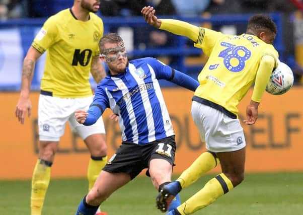 Back in action: Owls striker Sam Winnall against Blackburn Rovers.