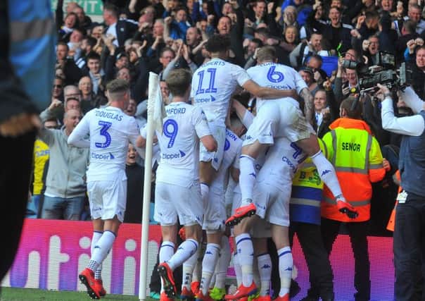 Victory: 
Leeds players celebrate Pablo Hernandez's winning goal. Picture: Tony Johnson.