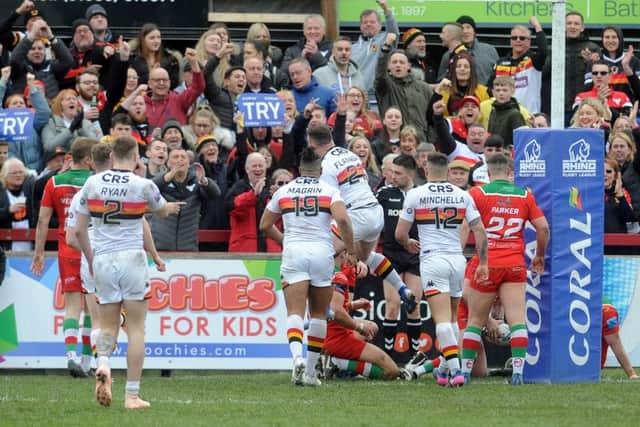 Bradford's George Flanagan celebrates his try in front of the Bulls fans.