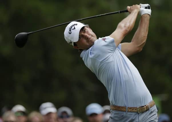 Kevin Kisner watches his tee shot on the third hole during the final round of the PGA Championship golf tournament at the Quail Hollow Club Sunday. (AP Photo/Chuck Burton)