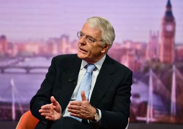 Sir John Major has cautioned against a snap election.