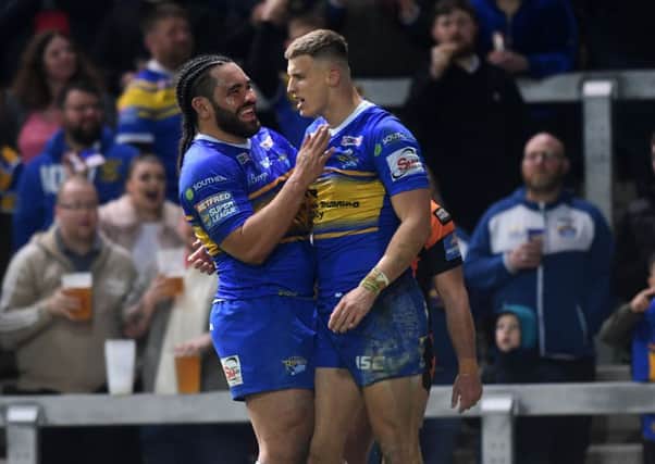 Leeds Rhinos' Ash Handley, right, celebrates his try against Castleford Tigers last Thursday with fellow try-scorer Konrad Hurrell (Picture: Jonathan Gawthorpe).
