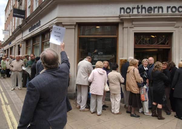 Customers queuing outside a Northern Rock branch in York