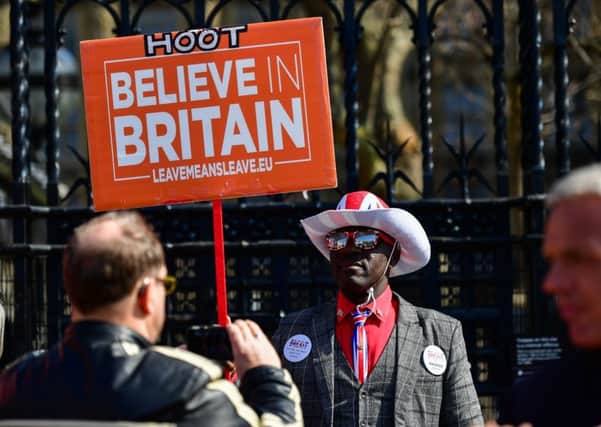 A pro-Brexit protester outside the Houses of Parliament.
