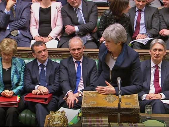 Theresa May speaks during Prime Minister's Questions. Credit should read: House of Commons/PA