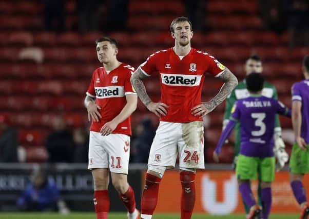 Middlesbrough's Aden Flint (right) and Jordan Hugill (left) show their frustration at The Riverside. Picture: Martin Rickett/PA