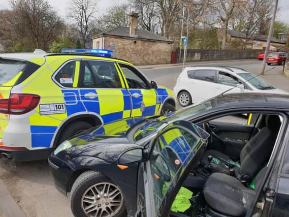 A car thief who wanted for three burglaries tried to ram these police 4x4s on a Yorkshire road. Photo credit: @WYP_TrafficDave West Yorkshire Police.