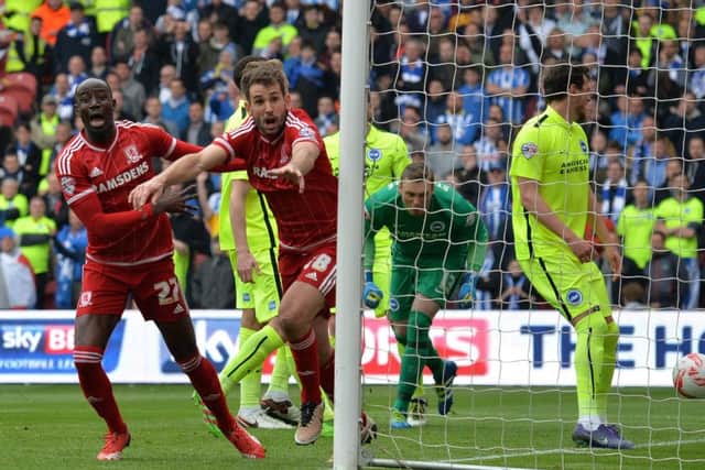 Middlesbrough's Christian Stuani(centre) celebrates after scoring his side's first goal as Middlesbrough beat Brighton to promotion in 2016 (Picture: PA)