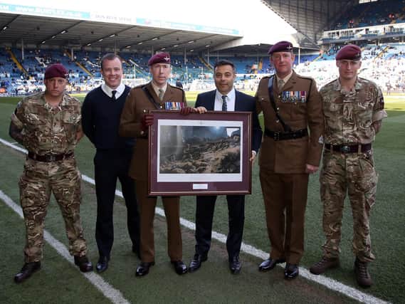 Leeds United chairman Andrea Radrizzani and chief executive Angus Kinnear with representatives from the Parachute Regiment.
