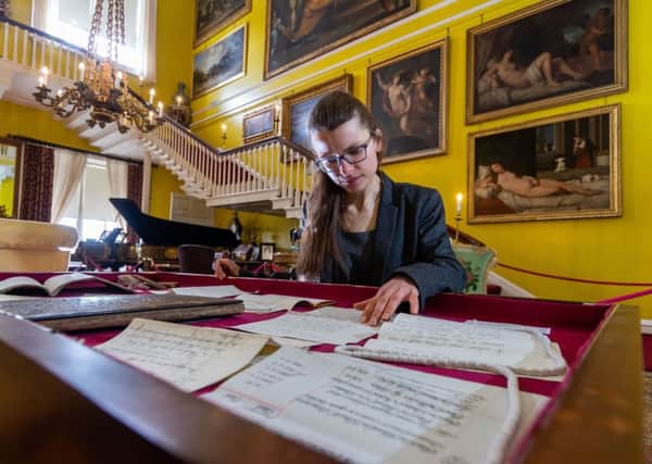 FRESH LOOK: Curator Philippa Wood, with documents from a new exhibition taking a fresh look at women branded difficult and meddlesome, at Burton Constable Hall, near Hull. PIC: James Hardisty