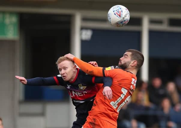 Doncaster Rovers' Ali Crawford and Luton Town's Elliot Lee challenge for the ball at Kenilworth Road last month (Picture: Chris Radburn/PA Wire).