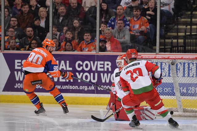 FIVE-HOLE: John Armstrong, far right, spins away after making it 5-1 to the Steelers. Picture: Dean Woolley.