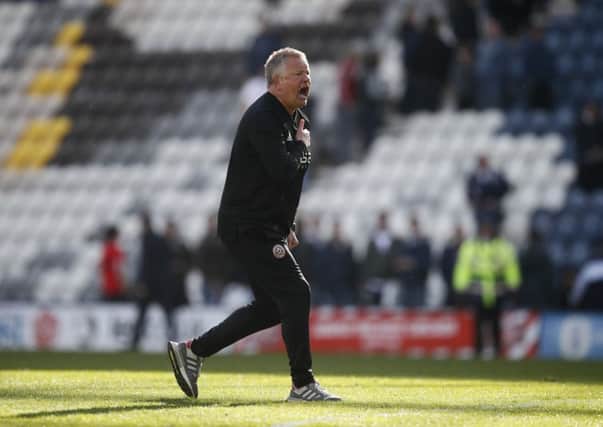 Chris Wilder: Sheffield United chief celebrates with the 5,500-plus Blades fans.