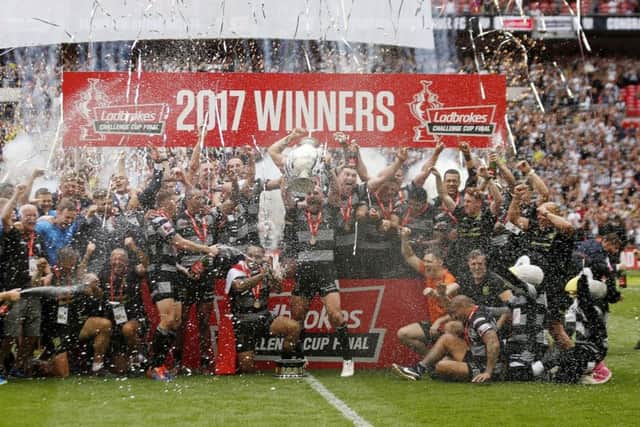 Hull FC's Gareth Ellis celebrates with the trophy after the Ladbrokes Challenge Cup Final at Wembley. Picture: Paul Harding/PA