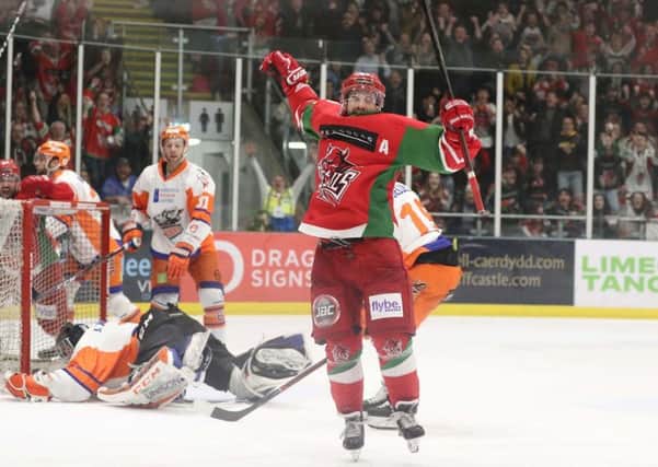 Joey Martin skates away to celebrate after scoring one of his three goals against Sheffield Steelers. Picture: EIHL/Cardiff Devils.
