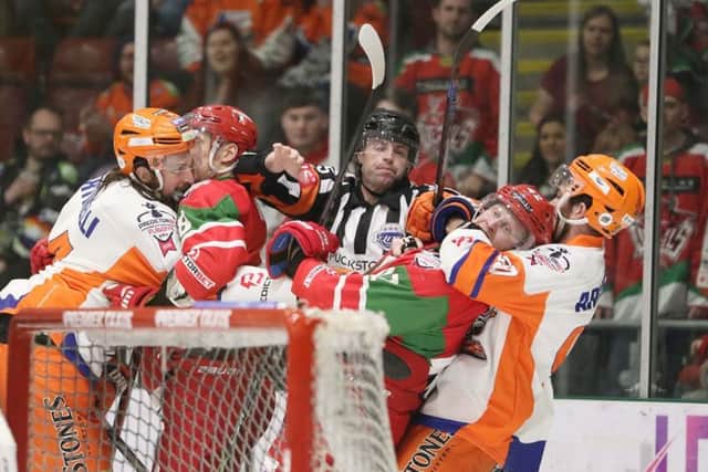 Cardiff and Sheffield players take each other to task behind the Steelers' goal during Sunday night's second leg. Picture courtesy of EIHL/Cardiff Devils