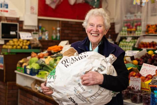 Joan Ward, 90, has been running her fruit and veg stall in Wath's Value for Money Market for nearly seventy years. Photo: SWNS