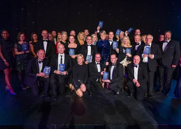 Date: 2nd November 2017.
Picture James Hardisty.
The Yorkshire Post Excellence in Business Awards, held at Royal Armouries and The New Dock, Leeds.
Pictured The award winners celebrating on stage after the ceremony.