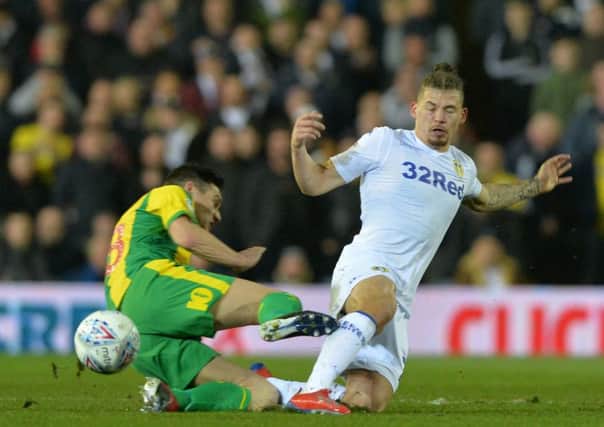 Leeds United's Kalvin Phillips duels with Gareth Barry, of West Bromwich Albion, in last month's Championship game at Elland Road (Picture: Bruce Rollinson).