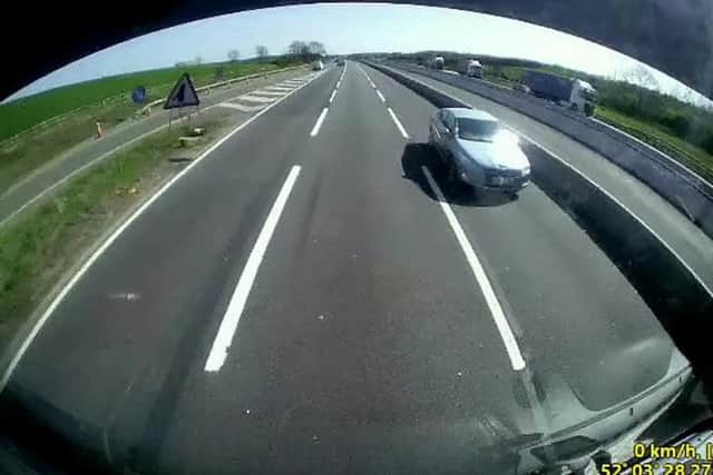 Coming in hot: The Audi drove towards the van driver, as captured on this dashcam. Photos: SWNS