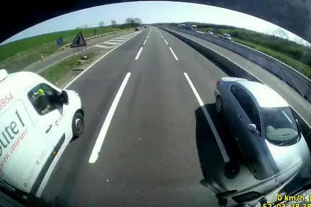 Coming in hot: The Audi drove towards the van driver, as captured on this dashcam. Photos: SWNS