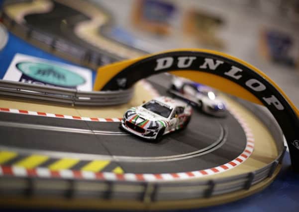 A Scalextric electric car racing set on display. Pic: Yui Mok/PA Wire