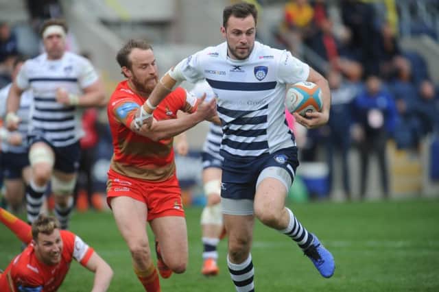 Andy Forsyth runs through to score for Yorkshire Carnegie in their final game before it was announced they would be going part-time next season (Picture: Steve Riding).