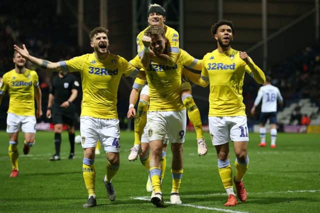 Leeds United's Patrick Bamford (centre) celebrates scoring his side's second goal of the game at Deepdale. Picture: Nigel French/PA