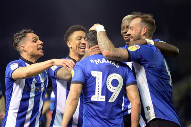 Goalscorer Marco Matias is mobbed by his Sheffield Wednesday team-mates. Picture: Steve Ellis