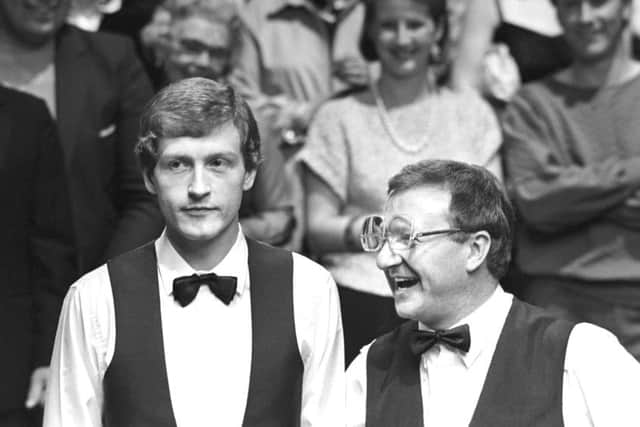 Dennis Taylor (right) and Steve Davis at the end of the World Snooker Championship final at the Crucible in 1985. Photo: PA/PA Wire.