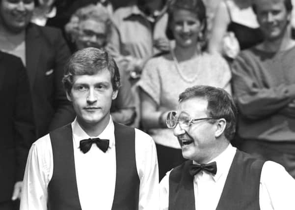 Dennis Taylor (right) and Steve Davis at the end of the World Snooker Championship final at the Crucible in 1985. Photo: PA/PA Wire.