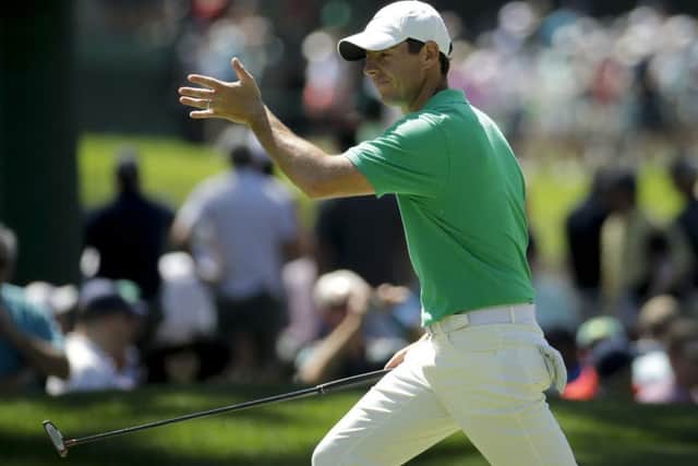 Rory McIlroy, of Northern Ireland, walks to the sixth green during a practice round for the Masters. (AP Photo/Charlie Riedel)
