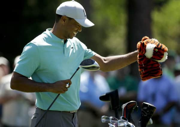 Feeling relaxed: Four-time winner Tiger Woods during a practice round ahead of the Masters. (AP Photo/Charlie Riedel)