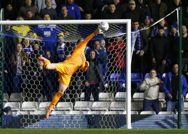 Dean Henderson of Sheffield United saves a Che Adams shot (Pictures: James Wilson/Sportimage