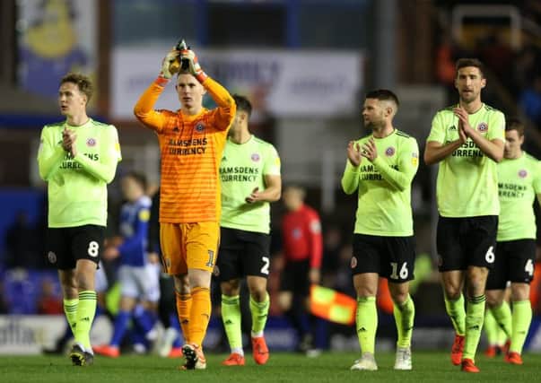 NOT QUITE: Sheffield United's players applaud the travelling fans at St Andrews. Picture: James Wilson/Sportimage