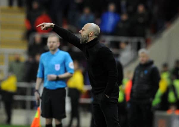 Rotherham United boss Paul Warne gets his instructions out in the defeat to Aston Villa on Wednesday night. Picture: Tony Johnson.