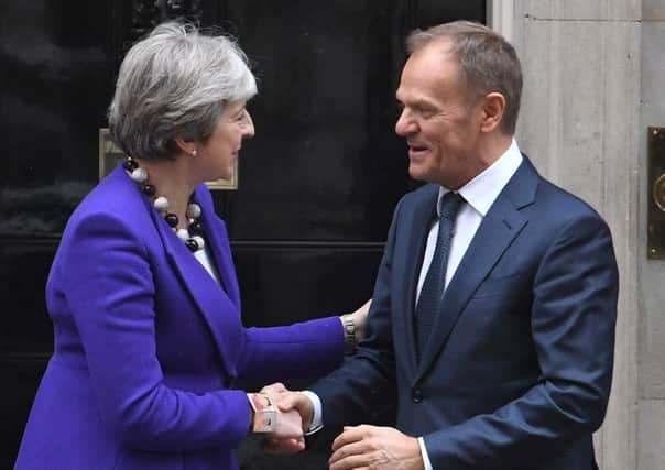 Prime Minister Theresa May with Donald Tursk, the president of the European Council. Photo: Victoria Jones/PA Wire