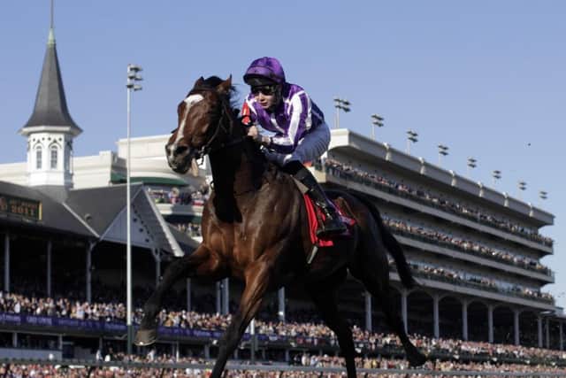 Joseph O'Brien rides St Nicholas Abbey to victory during the Turf race at the Breeders' Cup horse races at Churchill Downs in 2011, in Louisville, Ky. (AP Photo/David J. Phillip)